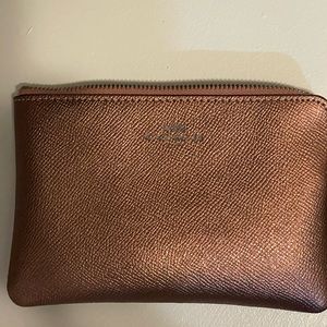 Coach wristlet in raspberry